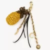 Ananas-Taschenanhänger aus Bast, Metall und Leder Ananas-Taschenanhänger aus Bast, Metall und Leder