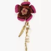 Blumen-Taschenanhänger aus Bast und Metall Blumen-Taschenanhänger aus Bast und Metall