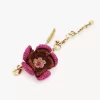 Blumen-Taschenanhänger aus Bast und Metall Blumen-Taschenanhänger aus Bast und Metall