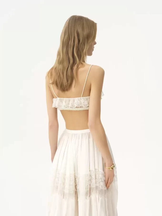 Bralette mit dünnen Trägern und Rüschen aus bestickter Spitze Bralette mit dünnen Trägern und Rüschen aus bestickter Spitze