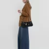 Die 99 Umhängetasche aus Leder mit Kroko-Effekt Die 99 Umhängetasche aus Leder mit Kroko-Effekt