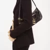 Die 99 Umhängetasche aus Leder mit Kroko-Effekt Die 99 Umhängetasche aus Leder mit Kroko-Effekt
