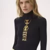 Figurbetonter Rollkragenpullover aus Baumwoll-Woll-Strick Figurbetonter Rollkragenpullover aus Baumwoll-Woll-Strick