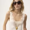 Figurbetontes Tanktop aus Baumwolljersey und Guipure Figurbetontes Tanktop aus Baumwolljersey und Guipure