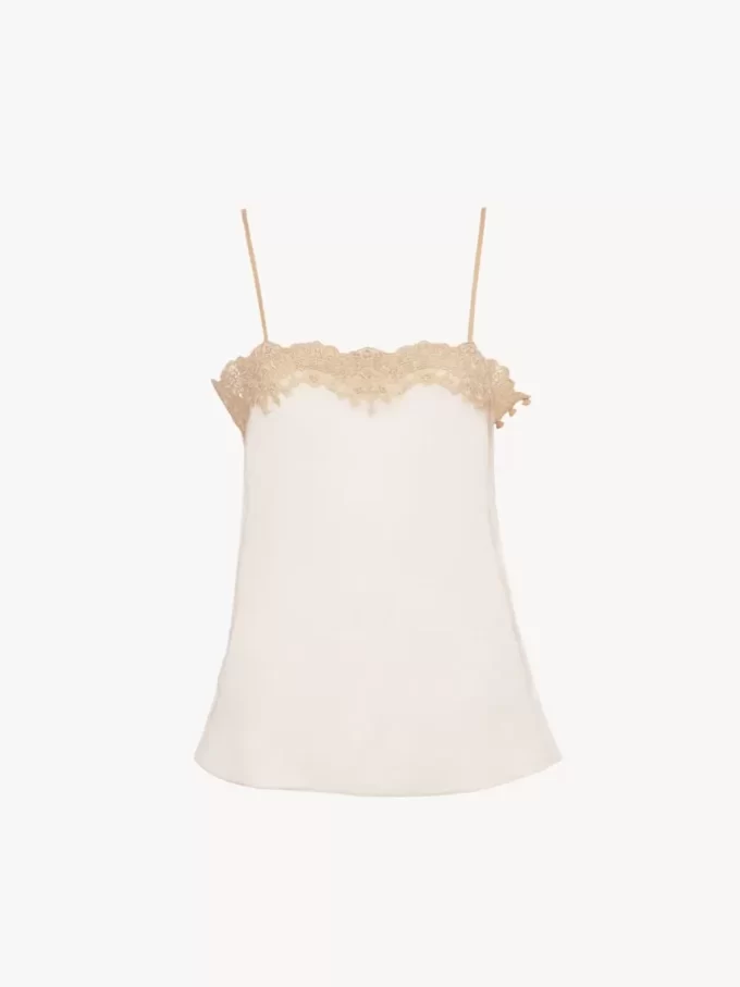 Figurbetontes Tanktop aus bestickter Spitze Figurbetontes Tanktop aus bestickter Spitze