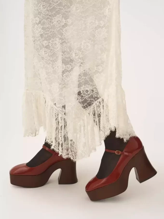 Gerüschter Midirock aus floralem Spitzen-Jacquard Gerüschter Midirock aus floralem Spitzen-Jacquard