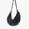 Große Hobo-Tasche „Armband“ aus genarbtem Leder mit Nieten Große Hobo-Tasche „Armband“ aus genarbtem Leder mit Nieten