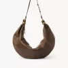 Große Hobo-Tasche mit Armband aus genarbtem Leder Große Hobo-Tasche mit Armband aus genarbtem Leder
