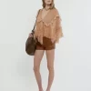 Große Hobo-Tasche mit Armband aus genarbtem Leder Große Hobo-Tasche mit Armband aus genarbtem Leder