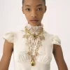 Hochgeschlossenes Minikleid aus Jacquard-Seide und Spitze Hochgeschlossenes Minikleid aus Jacquard-Seide und Spitze
