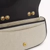 Horse Medal Umhängetasche aus Canvas und genarbtem Leder Horse Medal Umhängetasche aus Canvas und genarbtem Leder