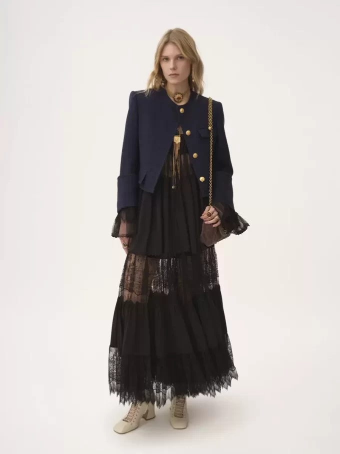 Kastige, kragenlose Jacke aus Wolle mit Karomuster Kastige, kragenlose Jacke aus Wolle mit Karomuster