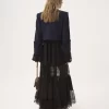 Kastige, kragenlose Jacke aus Wolle mit Karomuster Kastige, kragenlose Jacke aus Wolle mit Karomuster