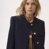 Kastige, kragenlose Jacke aus Wolle mit Karomuster Kastige, kragenlose Jacke aus Wolle mit Karomuster