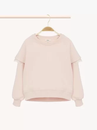 Kinderpullover mit Rüschen