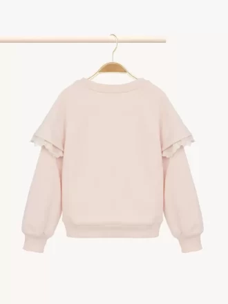 Kinderpullover mit Rüschen