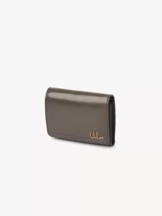 Kleine Chloé Iconic Trifold mit Münzfach aus glänzendem Leder