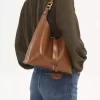 Kleine Hobo-Tasche Marcie aus glänzendem Leder Kleine Hobo-Tasche Marcie aus glänzendem Leder