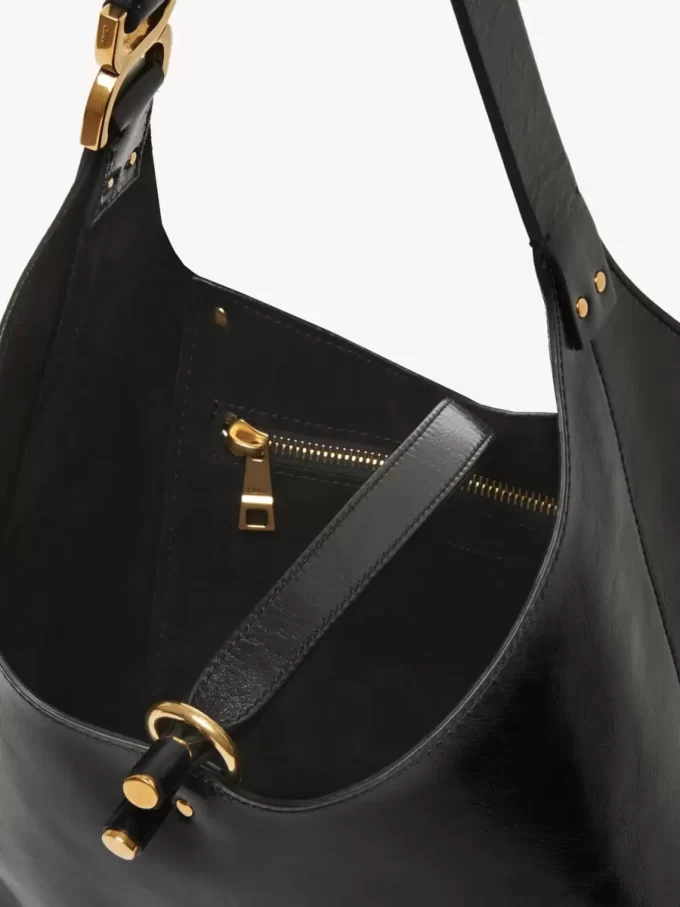 Kleine Hobo-Tasche Marcie aus glänzendem Leder Kleine Hobo-Tasche Marcie aus glänzendem Leder