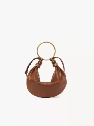 Kleine Hobo-Tasche mit Armband aus genarbtem Leder