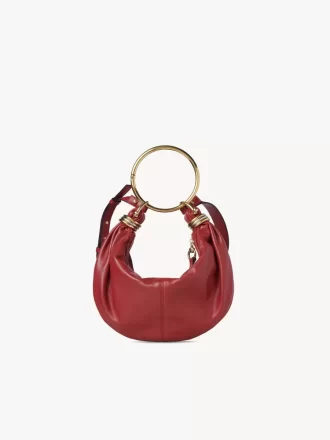 Kleine Hobo-Tasche mit Armband aus genarbtem Leder