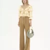 Kleine Hobo-Tasche mit Armband aus genarbtem Leder Kleine Hobo-Tasche mit Armband aus genarbtem Leder