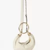 Kleine Hobo-Tasche mit Armband aus genarbtem Leder Kleine Hobo-Tasche mit Armband aus genarbtem Leder