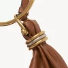 Kleine Hobo-Tasche mit Armband aus genarbtem Leder Kleine Hobo-Tasche mit Armband aus genarbtem Leder