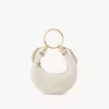 Kleine Hobo-Tasche mit Armband aus Häkelarbeit Kleine Hobo-Tasche mit Armband aus Häkelarbeit