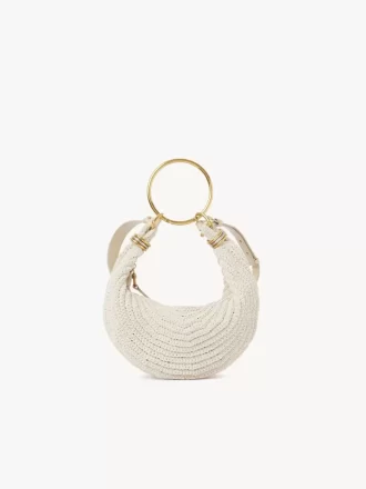 Kleine Hobo-Tasche mit Armband aus Häkelarbeit