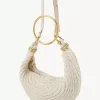 Kleine Hobo-Tasche mit Armband aus Häkelarbeit Kleine Hobo-Tasche mit Armband aus Häkelarbeit