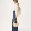 Kleine Hobo-Tasche mit Armband aus Häkelarbeit Kleine Hobo-Tasche mit Armband aus Häkelarbeit