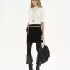 Kleine Hobo-Tasche mit Armband aus Leder mit Fransen Kleine Hobo-Tasche mit Armband aus Leder mit Fransen