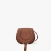 Kleine Marcie Satteltasche aus genarbtem Leder Kleine Marcie Satteltasche aus genarbtem Leder
