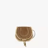 Kleine Marcie-Satteltasche aus Wildleder und Lammfell