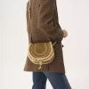 Kleine Marcie-Satteltasche aus Wildleder und Lammfell