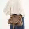 Kleine Marcie-Tasche aus glänzendem Leder Kleine Marcie-Tasche aus glänzendem Leder