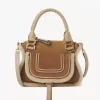 Kleine Marcie-Tasche aus Wildleder und Lammfell Kleine Marcie-Tasche aus Wildleder und Lammfell