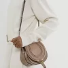 Kleine Satteltasche Marcie aus glänzendem Leder