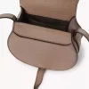 Kleine Satteltasche Marcie aus glänzendem Leder