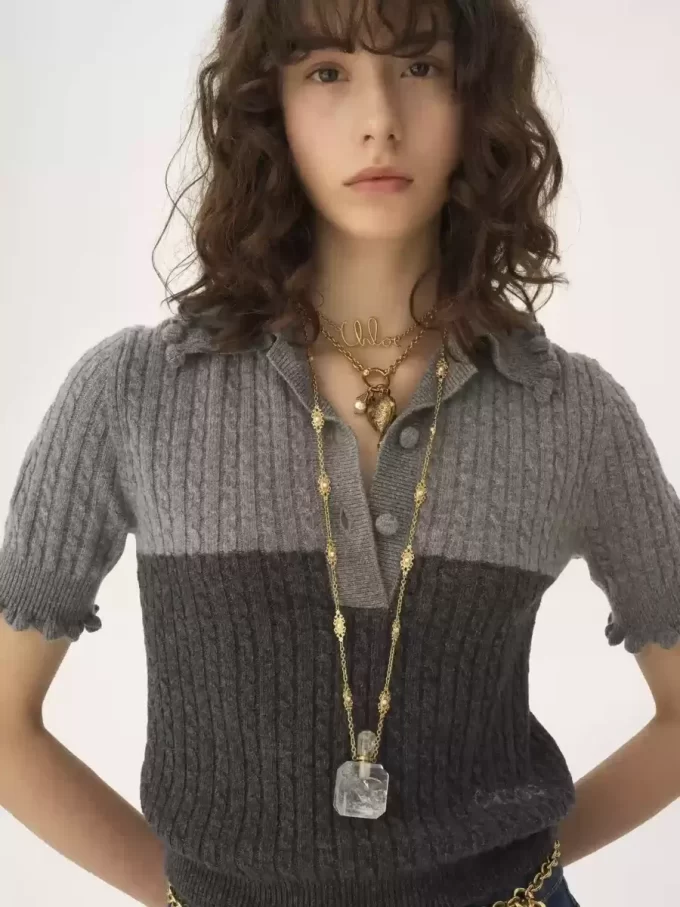 Kurzärmliger Polopullover aus Woll- und Kaschmirstrick Kurzärmliger Polopullover aus Woll- und Kaschmirstrick