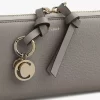 Lange Brieftasche mit Reißverschluss „Alphabet“ aus genarbtem Leder Lange Brieftasche mit Reißverschluss „Alphabet“ aus genarbtem Leder