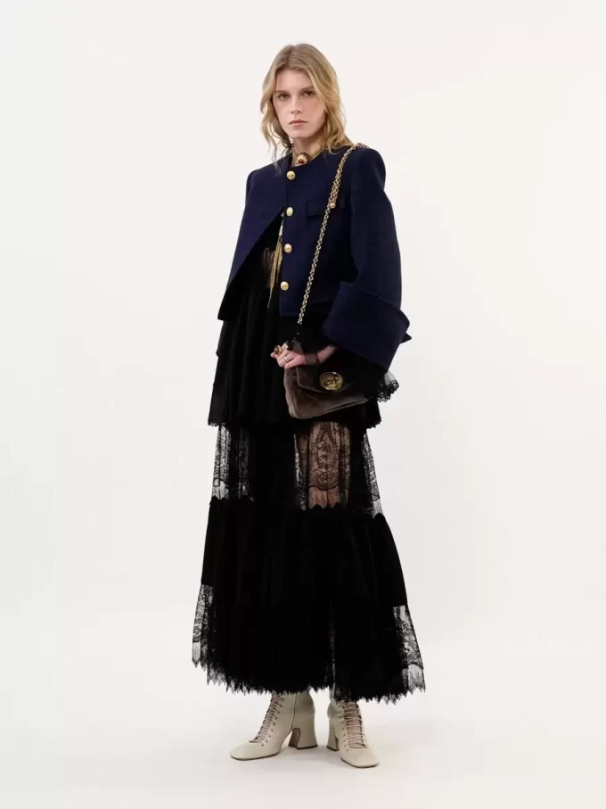 Kastige, kragenlose Jacke aus Wolle mit Karomuster Kastige, kragenlose Jacke aus Wolle mit Karomuster