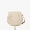 Marcie Satteltasche aus genarbtem Leder Marcie Satteltasche aus genarbtem Leder