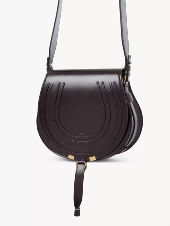 Marcie Satteltasche aus glänzendem Leder Marcie Satteltasche aus glänzendem Leder