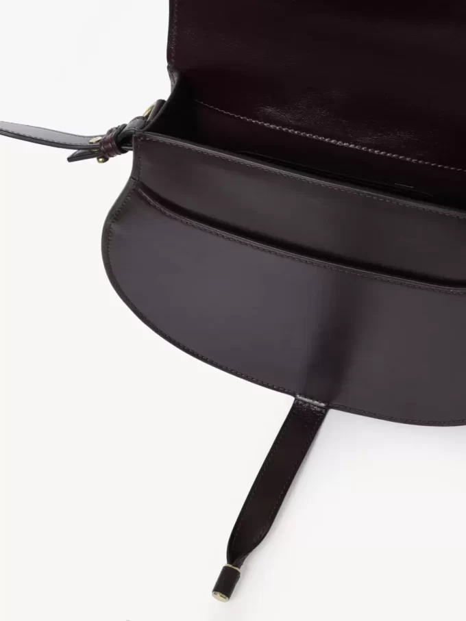 Marcie Satteltasche aus glänzendem Leder Marcie Satteltasche aus glänzendem Leder