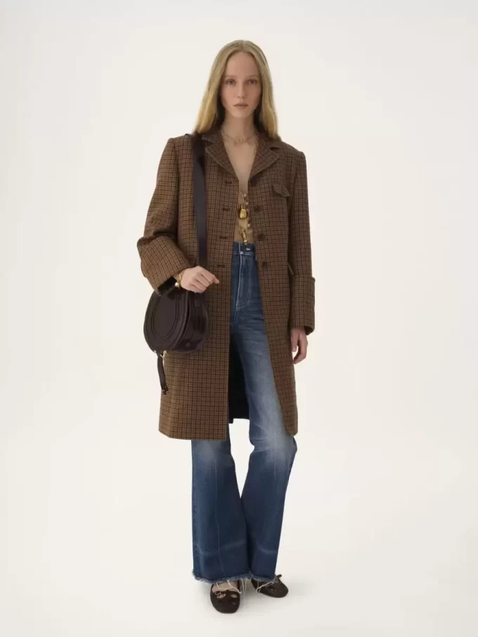 Marcie Satteltasche aus glänzendem Leder Marcie Satteltasche aus glänzendem Leder