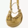 Mini-Armband-Hobo-Tasche aus Wildleder und Schlangenhaut Mini-Armband-Hobo-Tasche aus Wildleder und Schlangenhaut