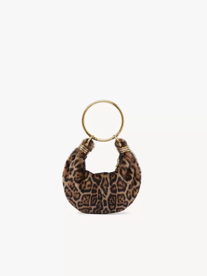 Mini Bracelet Hobo Bag aus Shearling mit Leopardenmuster Mini Bracelet Hobo Bag aus Shearling mit Leopardenmuster