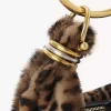 Mini Bracelet Hobo Bag aus Shearling mit Leopardenmuster Mini Bracelet Hobo Bag aus Shearling mit Leopardenmuster